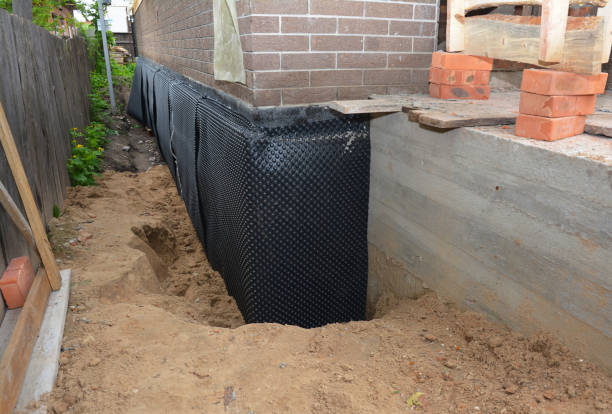Happy homeowners after waterproofing job in Farwell